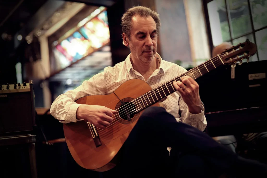 Tomas using the guitar